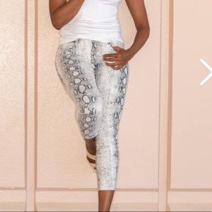 Snakeskin cropped skinnies